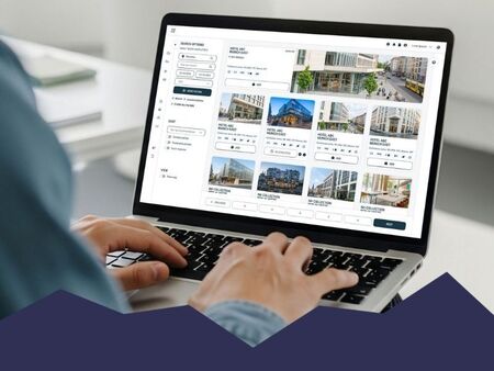 Laptop showing hotels and conference venues from across Europe in the MICE Partner Network, matched to a corporate meeting request