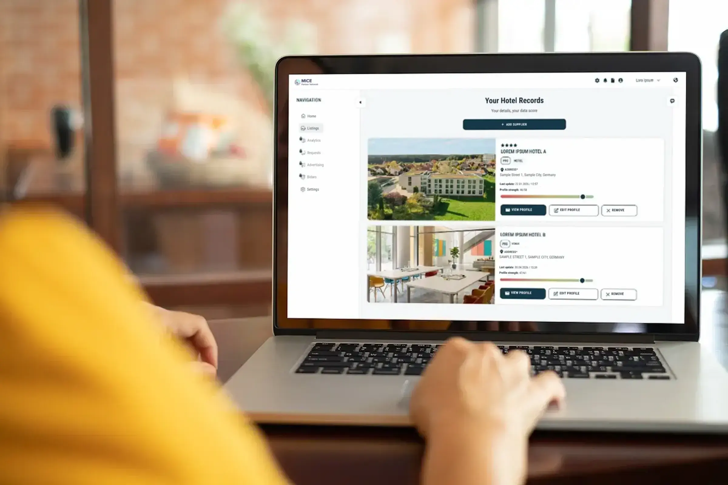 Supplier account in the MICE Partner Network on a laptop, showing two hotel records with a data score bar for each property profile and options to view or edit the profile